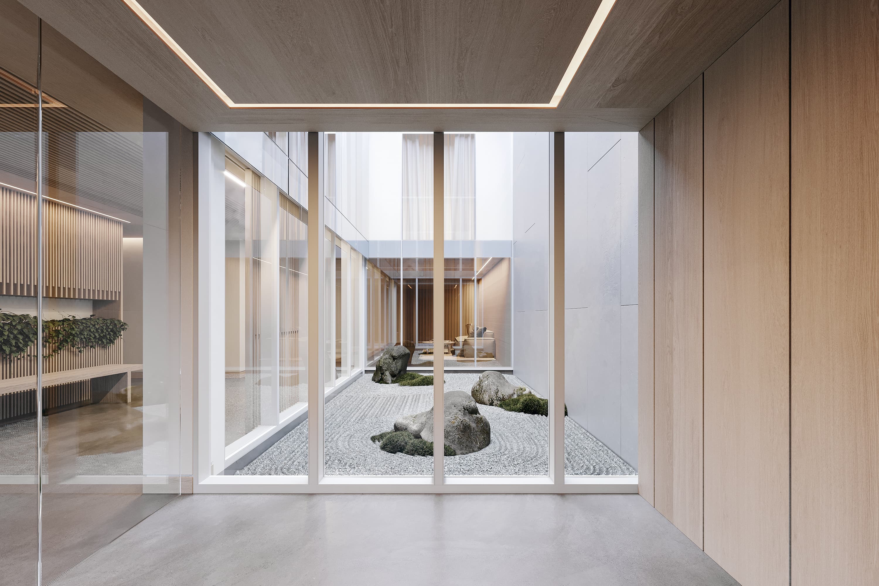 Contemporary residential courtyard viewed through full-height glazing