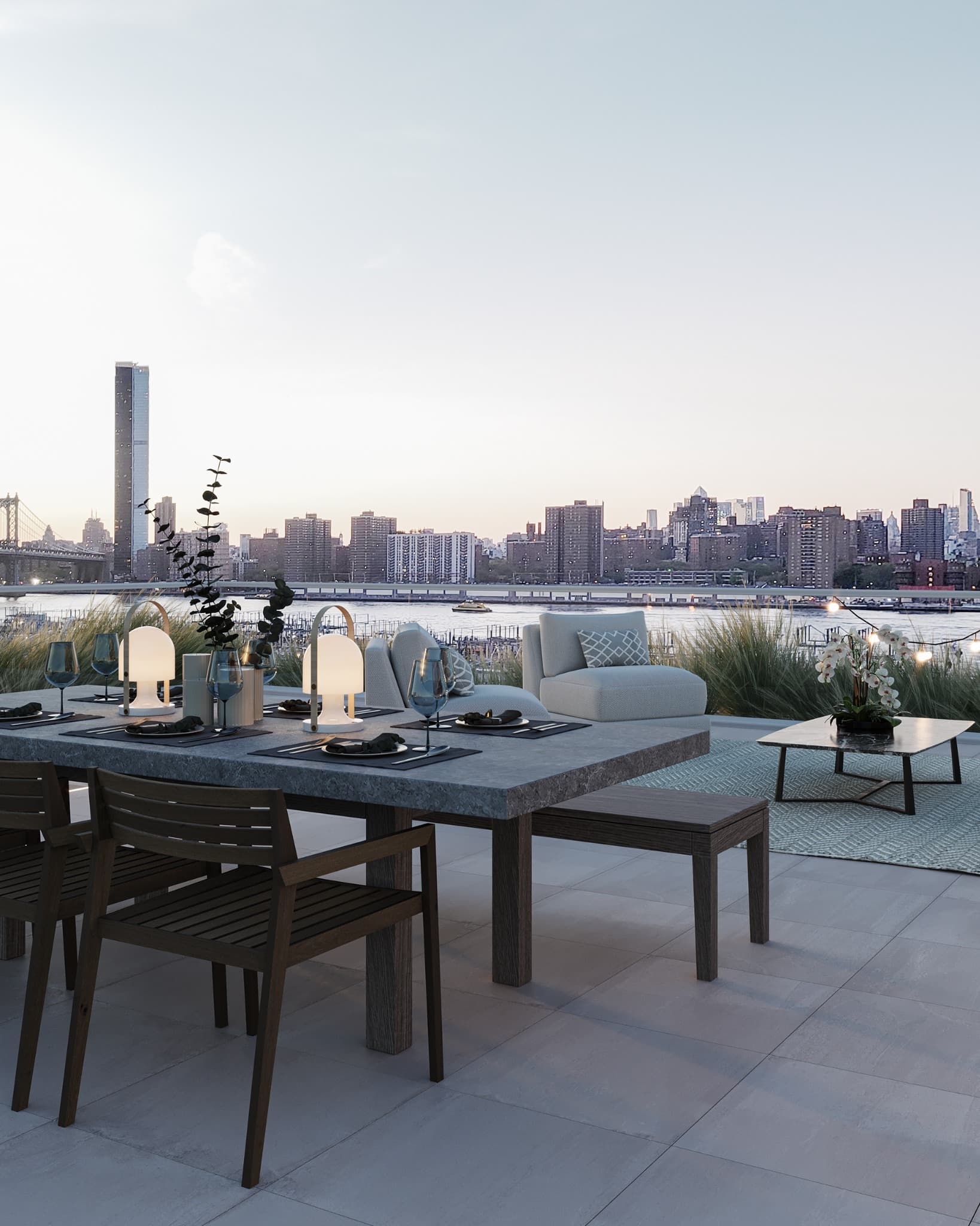 Outdoor residential terrace overlooking the East River and Manhattan skyline